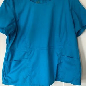Jaanuu peplum scrub top